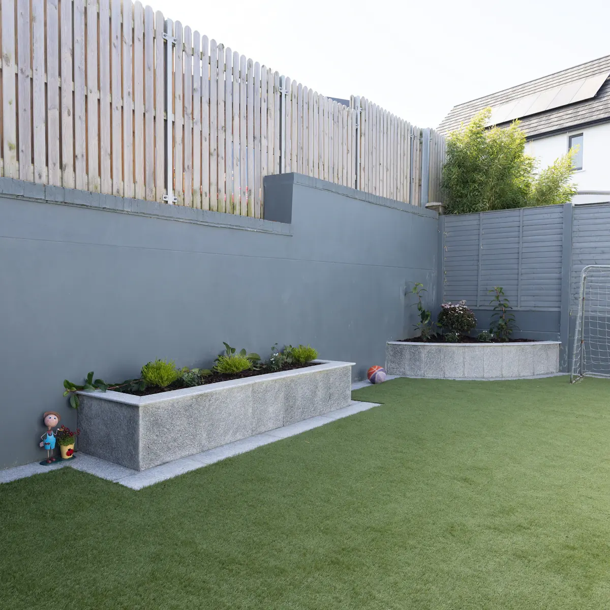 Lush artificial grass installed in a Tucson AZ residential backyard — UV-stable and monsoon-ready
